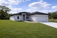 Building Photo - BRAND NEW MODERN SF HOME  3BD+den/2BA with GARAGE  IN LEHIGH ACRES!