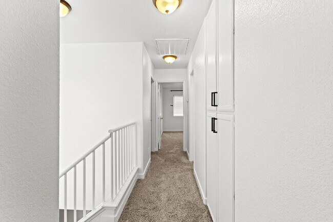 Building Photo - "Charming 3-Bedroom Townhouse Oasis with 2 Full Baths in Las Vegas – 1220 Sq Ft of Comfortable Li...