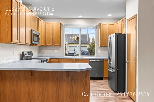 Building Photo - 11327 3rd Ave Ct E