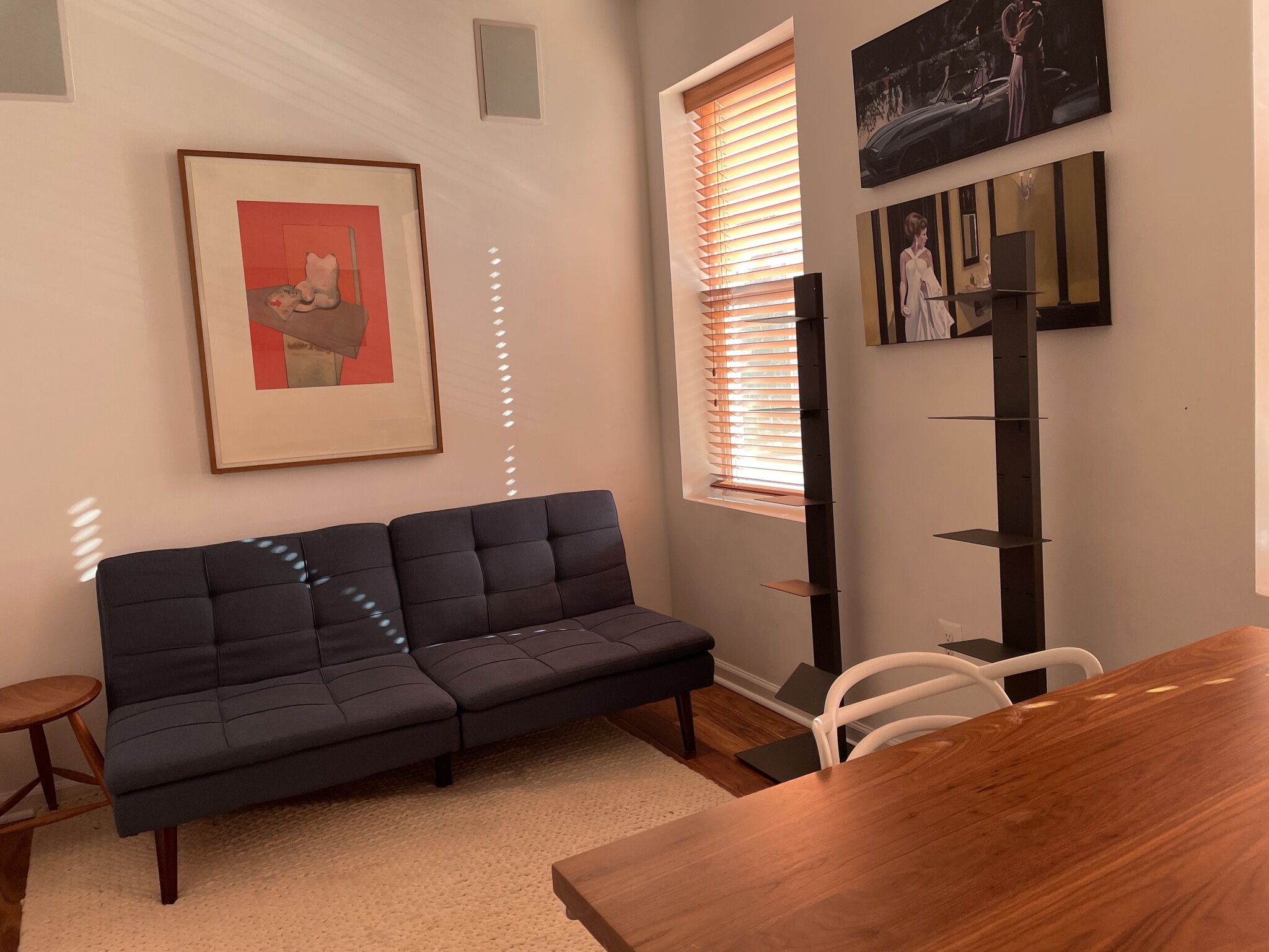 Second room -- Room and Board standing Walnut desk with a couchette that folds down to a full size sleeping bed. - 1003 P St NW