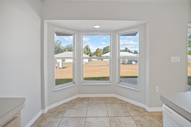 Building Photo - Fenced & Tiled 3/2/2 Summerfield Home For ...