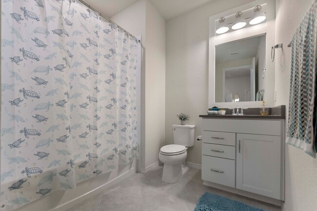 Building Photo - Introducing a captivating 3-story townhome...