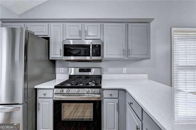 Building Photo - 5867 Tattersall Terrace