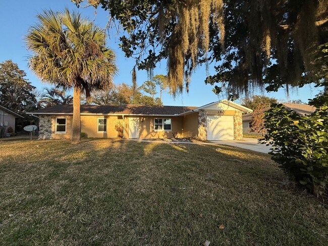Building Photo - Beautifully updated 4-bedroom, 2-bathroom pool home