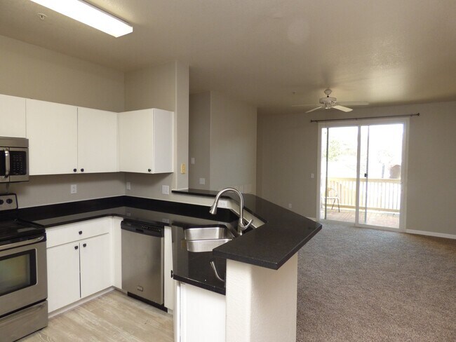Building Photo - SOUTHPARK, BEAUTIFUL UPDATES, NEW BLACK GRANITE COUNTERS, NEW CARPET, STAINLESS APPLIANCES, GARAGE!