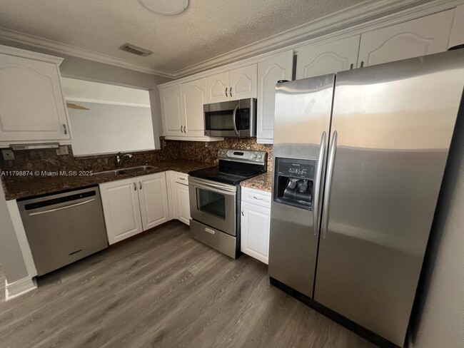 Building Photo - 15711 SW 137th Ave