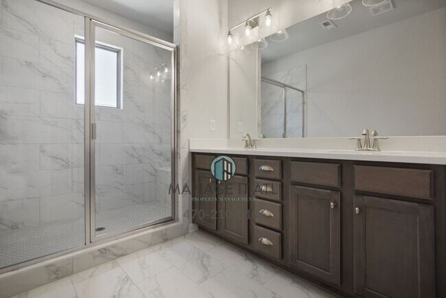 Building Photo - Modern 3-level Townhome featuring 4 bedroo...