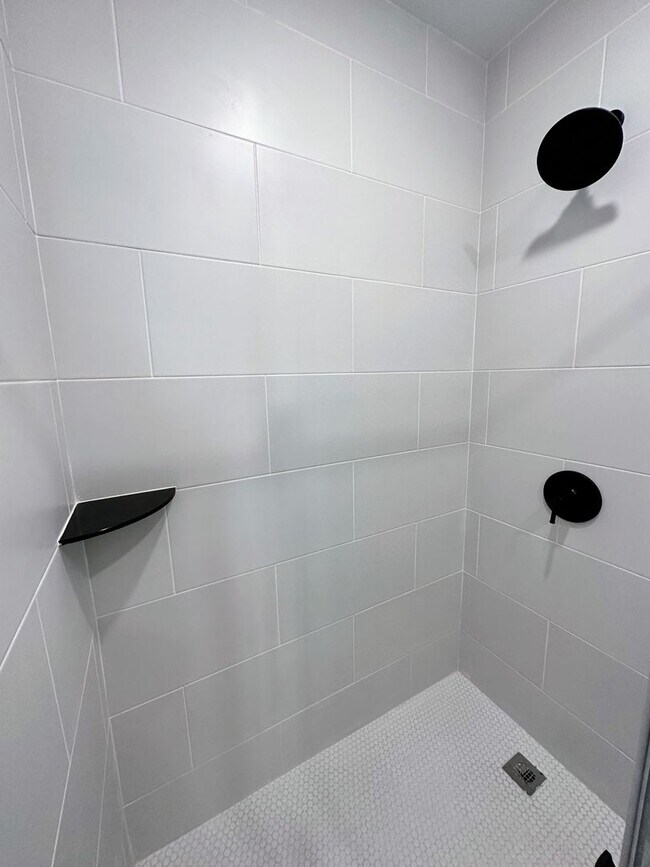 Building Photo - Renovated 2BR/2BA w/ Private Yard, Porch & In-Unit Laundry