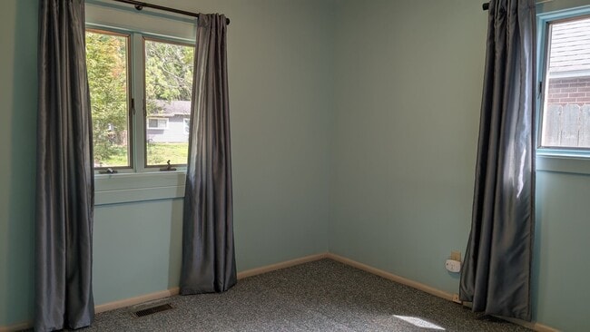 Building Photo - Three-Bedroom Home With Spacious Yard