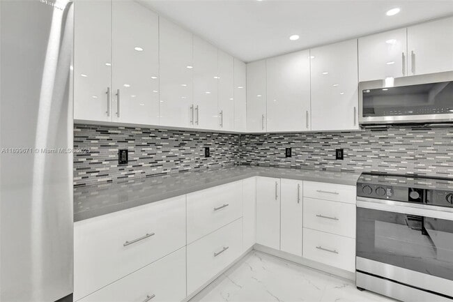 Building Photo - 9801 Collins Ave