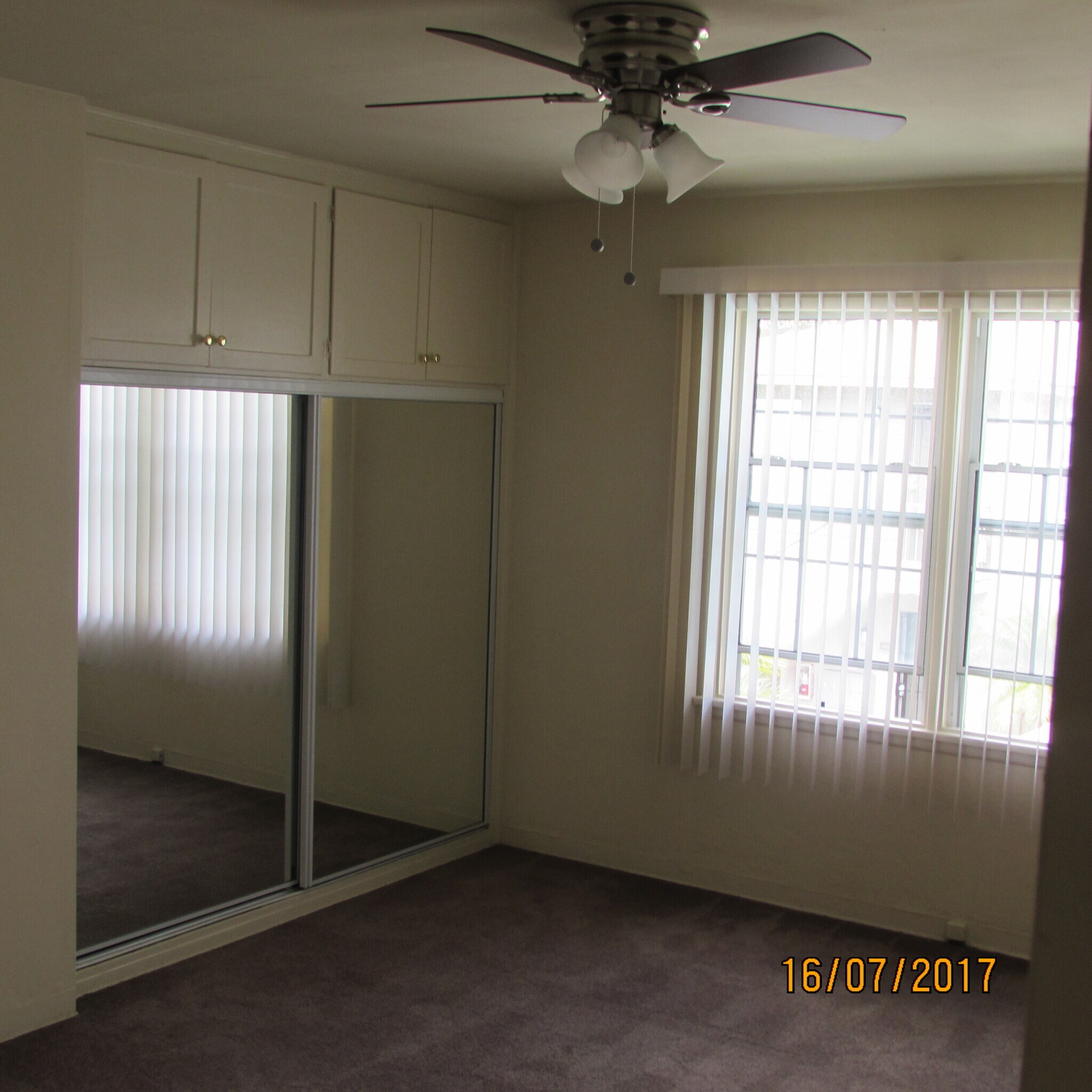 Mirror closet doors. New fans - 1149 E Carson St
