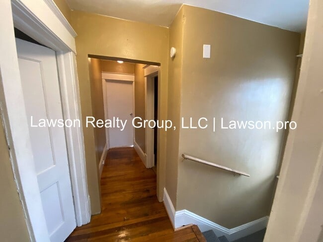 Building Photo - Updated Three Bedroom with Flat Yard