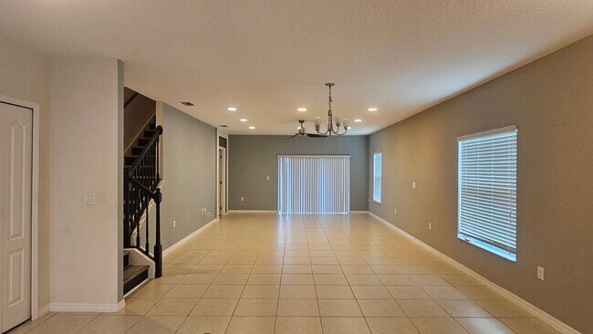 Building Photo - Beautiful Corner-Unit Townhome in a Gated Community!