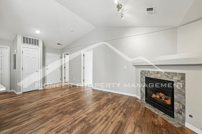 Building Photo - Updated Condo with Central AC and Gas Fireplace