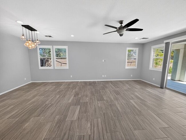 Building Photo - Stunning 5 Bed/5Bath Home in Gated Community – Over 3,100 SqFt of Modern Living -New Carpet throu...