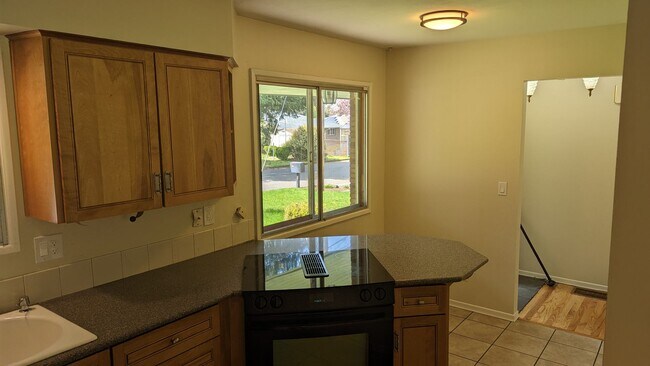 Building Photo - Spacious Three Bedroom with Large Backyard...