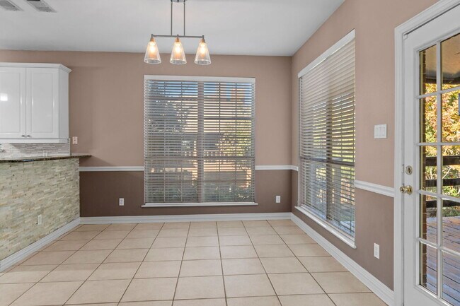 Building Photo - "Beautiful 4-Bedroom Home with Expansive Deck and Spacious Living Areas!"