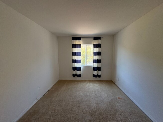 Building Photo - Welcome to this beautiful, light-filled ho...