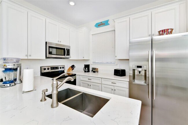 Building Photo - 8024 Flip Flop Way