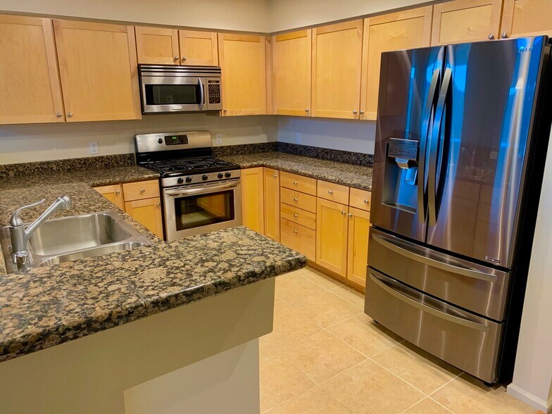High-end kitchen, newer LG black stainless fridge with water/ice - 21 Canyon View
