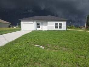 Building Photo - BRAND NEW 2/2/1- SW LEHIGH ACRES