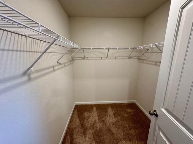 Building Photo - Located in Creedmore Hills a 4BR/2.5BA home with 2 car garage