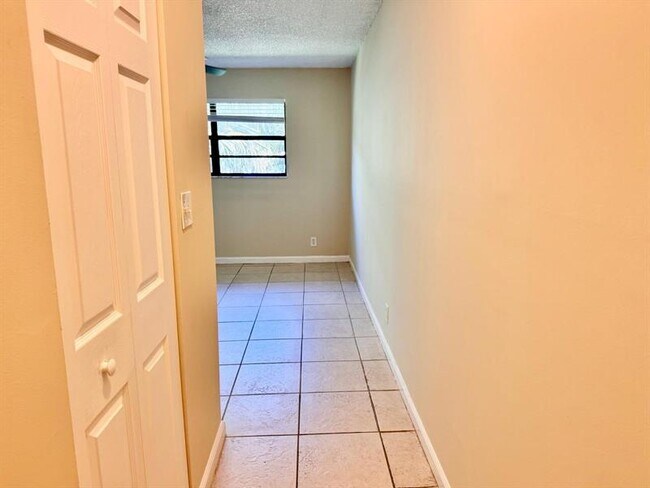 Building Photo - 11211 Royal Palm Blvd