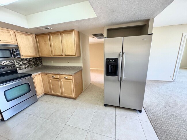 Building Photo - Amazing 2 Bedroom/2 Bath Condo!  Top Level Corner Unit with Spectacular Amenities!