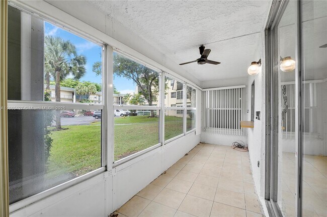 Building Photo - 9091 Lime Bay Blvd