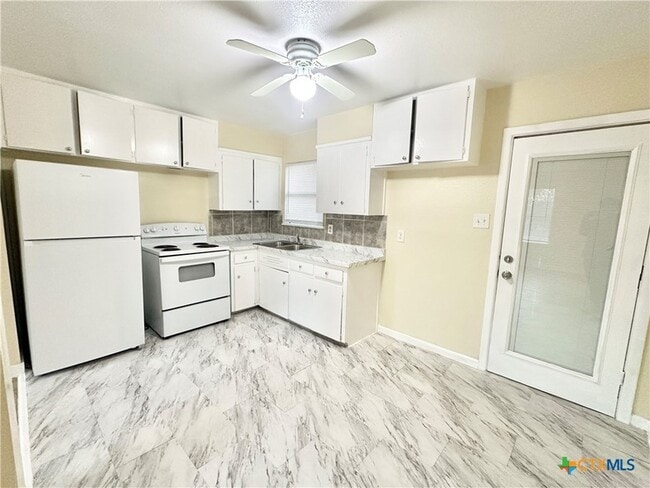 Building Photo - 104 E Fowler Ave