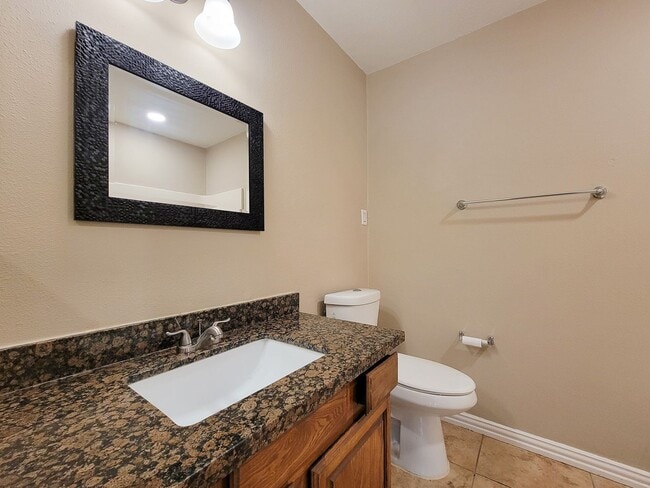 Building Photo - BEAUTIFUL 3 BEDROOM 2 BATH UPDATED HOME WITH TILE THROUGHOUT. GRANITE COUNTERTOPS WITH TILE FLOOR...