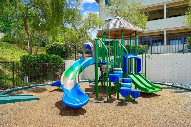 Building Photo - Beautifully Remodeled and Updated Upstairs Condo Unit in the Private & Gated Vista Way Village Co...