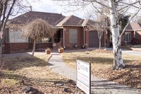 Building Photo - Evolve Real Estate: Available 8/8/26 Brick Tudor with Large Yard and Finished Basement!