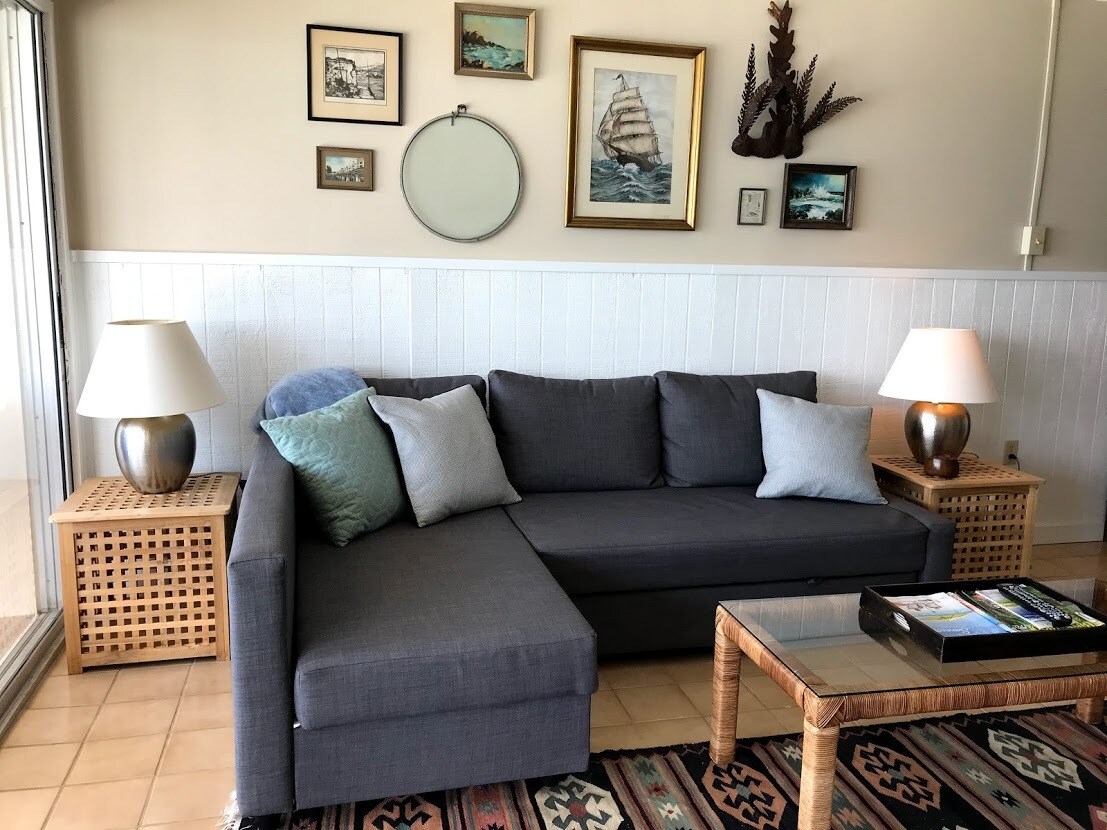 Living room with vintage nautical decor - 19450 Gulf Blvd