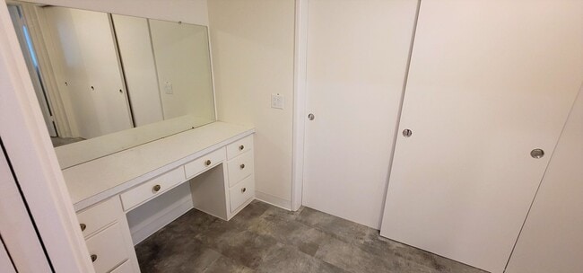 Building Photo - Classic, Midcentury 3 bedroom with Den, 2.5 bath home nestled into hillside with secluded backyar...