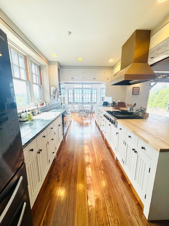 Building Photo - Majestic Farmhouse Retreat on 39 Acres wit...