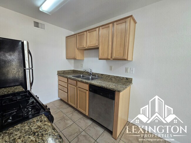 Building Photo - Fantastic, 2bd/1ba, Condo Home available in The Villaggio community, near Madison Ave. and Americ...