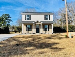 Building Photo - Almost New 2 story cottage home in the hea...