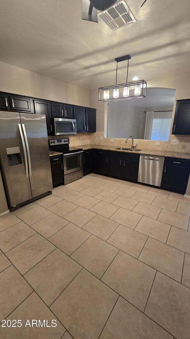 Building Photo - 17848 W Acapulco Ln