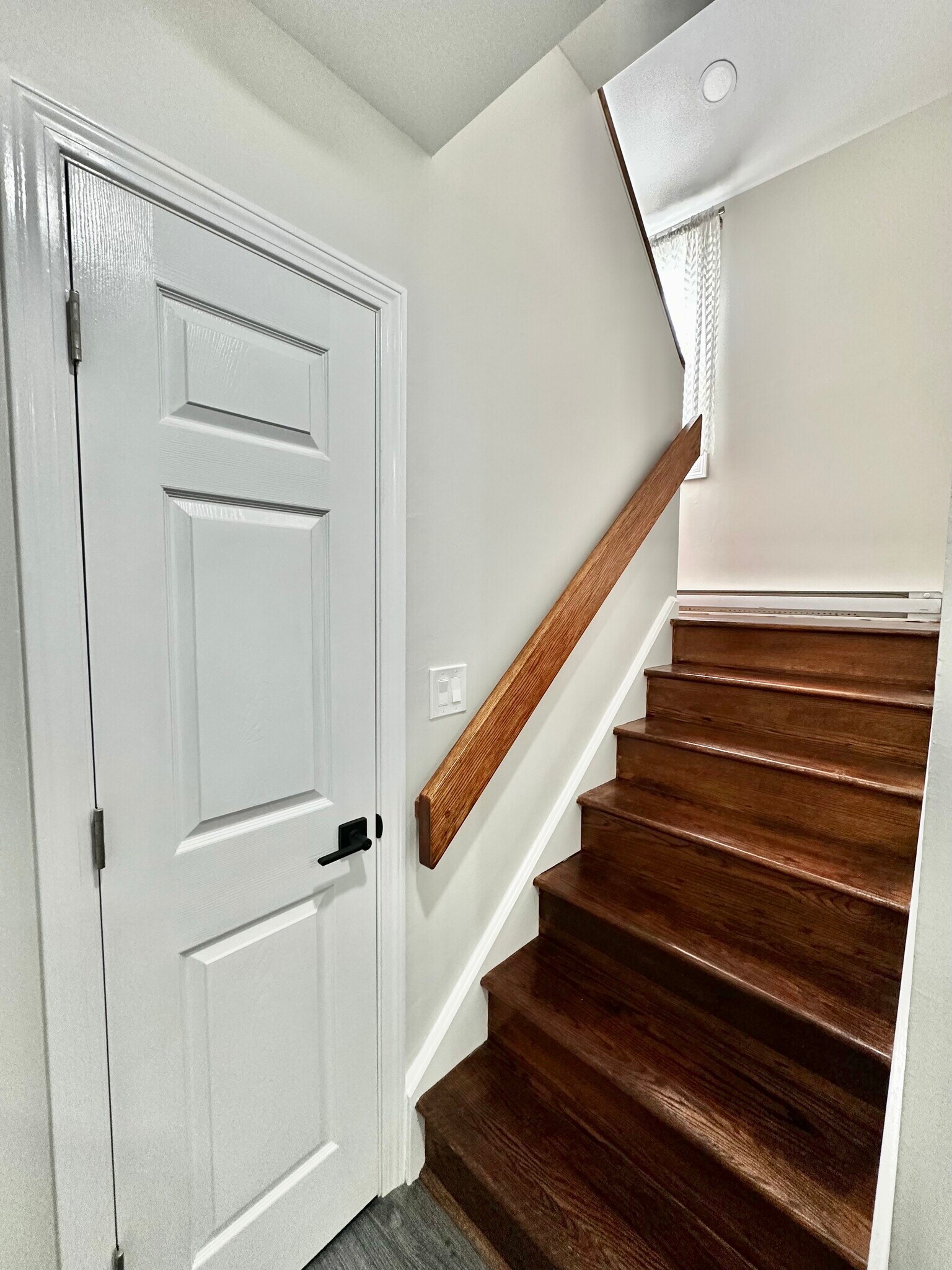 stairway heading down to bedroom level - 388 S Main St
