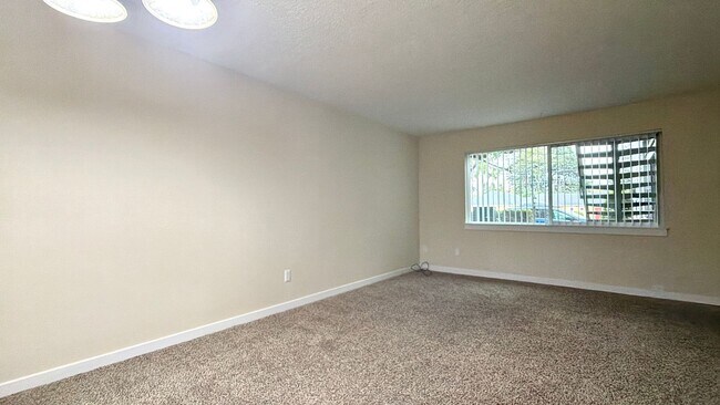 Building Photo - **FREE FIRST MONTH'S RENT** Montavilla 2 Bedroom Main Floor Apartment w/ A/C and Off Street Parki...
