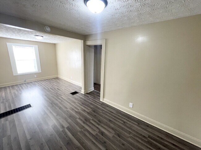 Building Photo - 3 Bedroom Home  with huge, 2-car garage/workshop combo (has electricity)