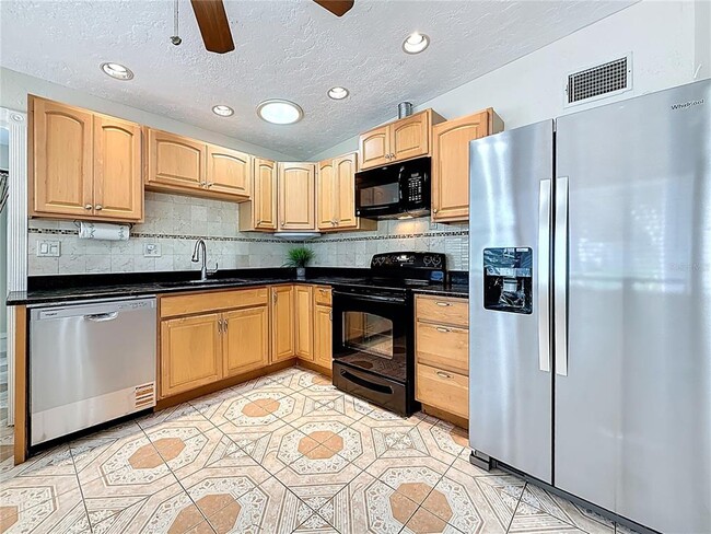 Building Photo - 6709 Orchard Dr N