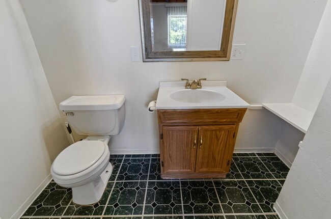 Building Photo - Available March 1, 2026. Updated 2 Bedroom 1.5 Bath Duplex with private dedicated pool.