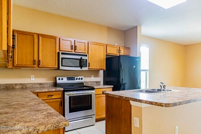 Building Photo - 4220 Plantation Oaks Blvd