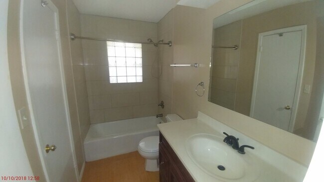 Building Photo - Three bedroom with office and family room ...