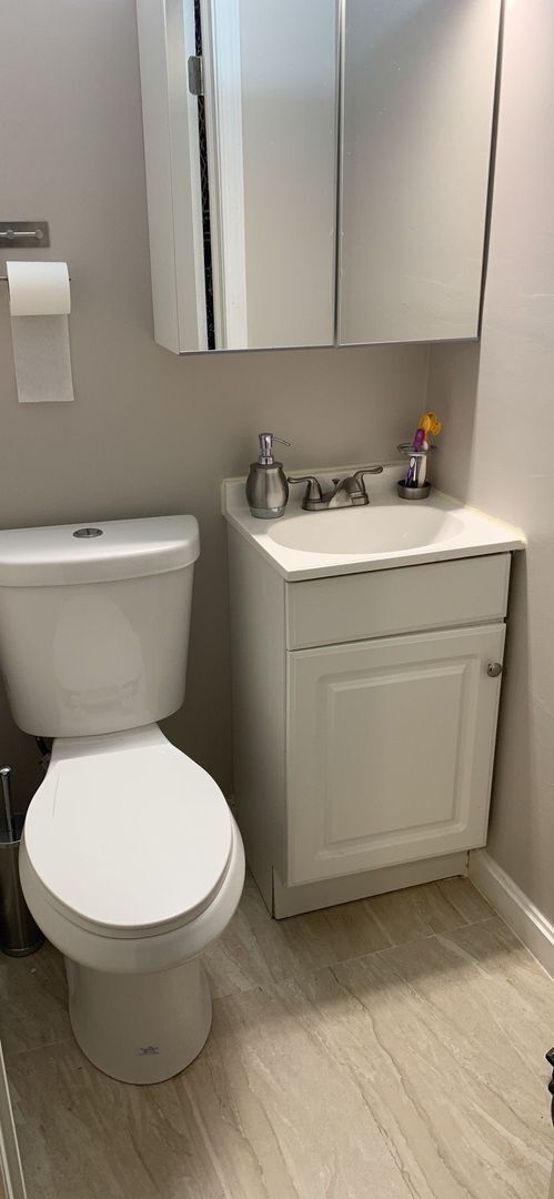 Building Photo - Stunning 4-Bedroom Townhome with Finished ...