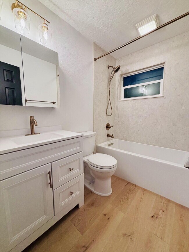 Building Photo - Coastal 4-Bedroom Oasis – Walk to the Beach!