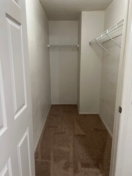 Master bedroom walk in closet - 5934 Brickleberry Ln