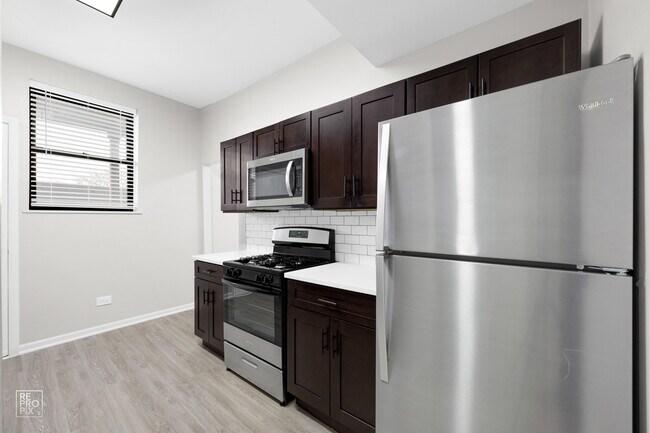 Building Photo - 5019 S St Lawrence Ave 600 E 50th Pl Chicago, IL 60615